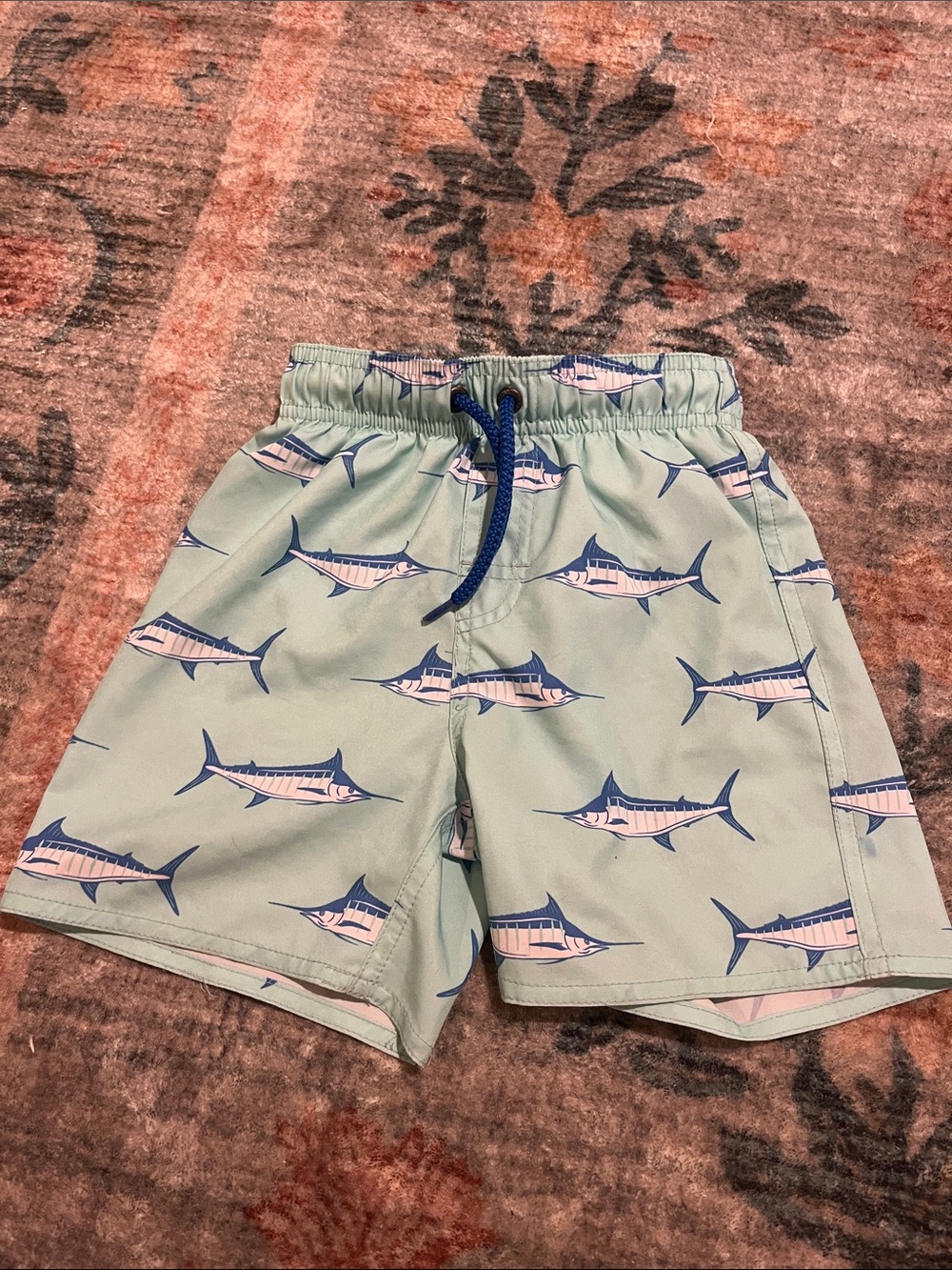 Class club blue marlin swim trunks